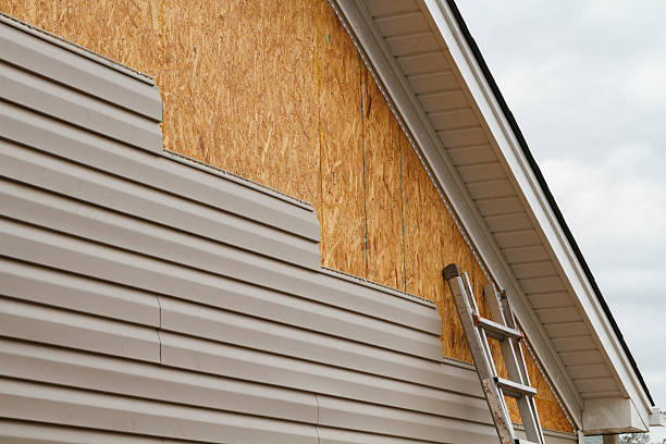 Professional Siding Repair technician working in Blue Point, NY